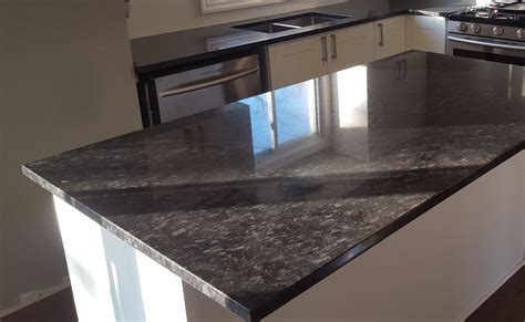 steel grey leathered granite with white cabinets|white leather granite countertop ideas.